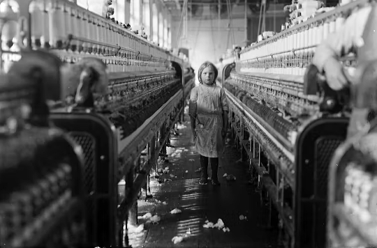young girl working in a factory